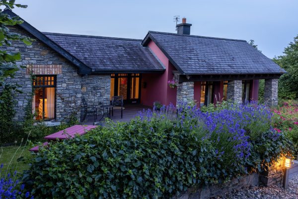 The lodge at dusk with lavender in the foreground